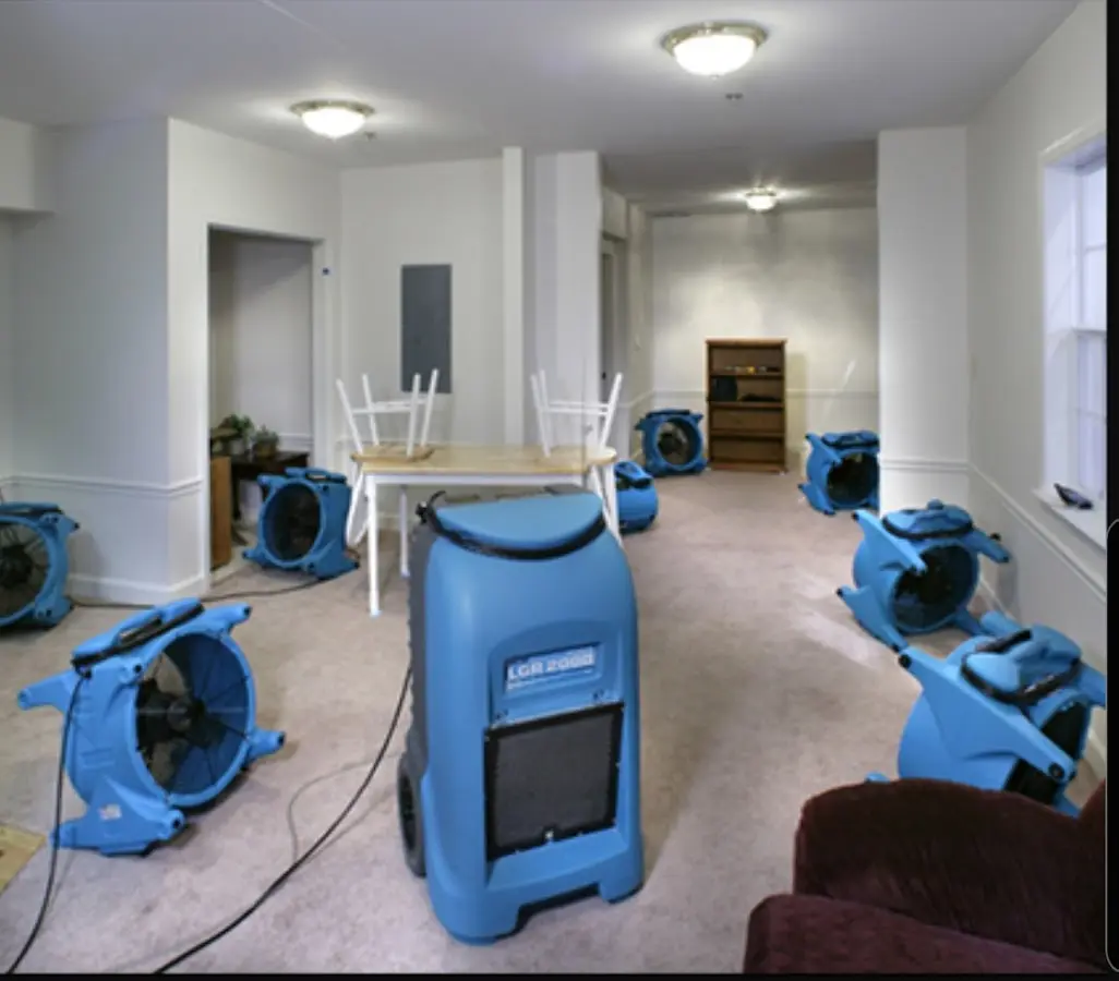 Air movers and dehumidifier setup for Water Damage Restoration in Bridgton